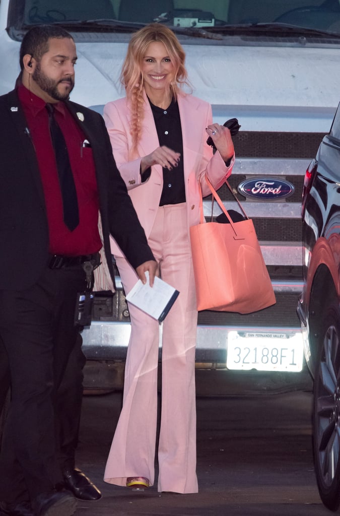 Julia wore this fabulous suit to match her flamingo pink hair when she visited Jimmy Kimmel Live in November 2018. She capped off her outfit with fun Christian Louboutin rainbow platforms.