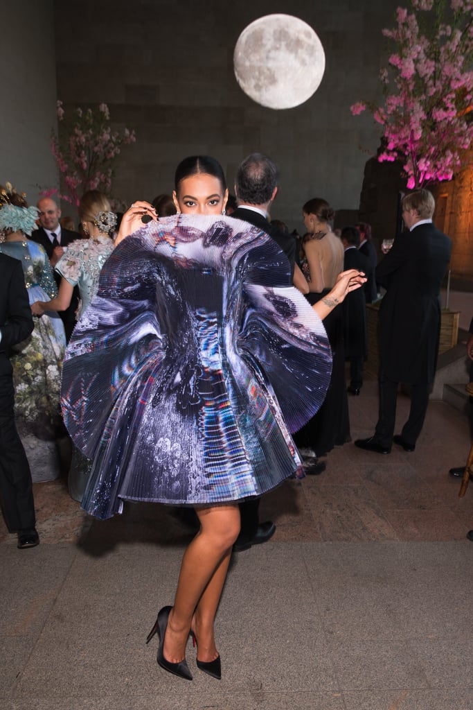Solange Knowles posed playfully in her futuristic frock at the Met Gala cocktail reception.