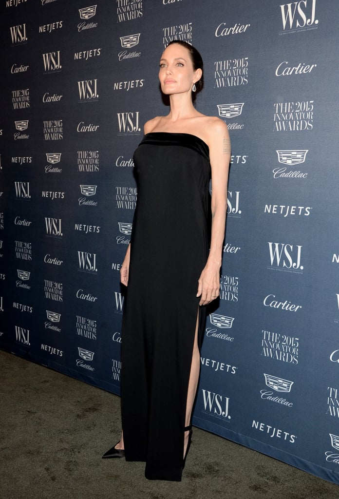 Angelina's black column dress was far from boring. Even without tons of jewels, the star looked elegant and regal in the Tom Ford number.