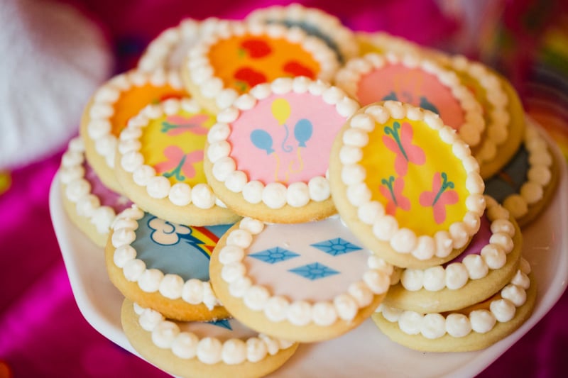 Harper Gray made custom cutie mark images that I had printed on edible icing sheets at a local bake shop.  These are super simple to make using my cookie and icing recipe in my book.