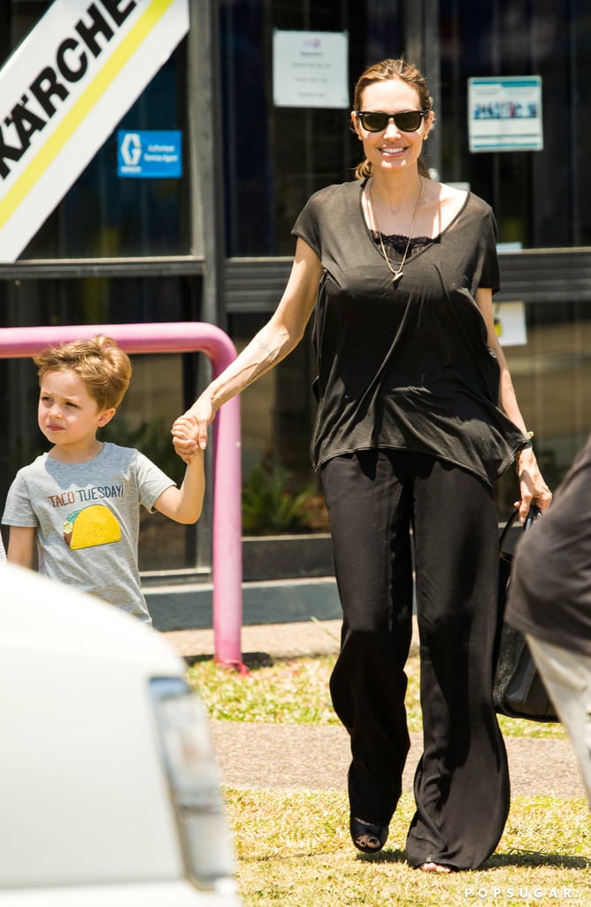 Angelina Jolie walked hand in hand with Knox when she brought Pax and the twins Halloween shopping in Australia on Saturday. The busy mom and actress has been stationed in Oz to work on her new directorial effort, Unbroken, bringing a war hero's story to the big screen. Angelina has been spending plenty of time with the kids between filming, and some of the little ones have been making trips to the UK to hang out with Brad Pitt, who has been filming Fury in England. Last week, Brad sat down with Ann Curry to talk about 12 Years a Slave, and his new film, The Counselor, hit theaters this weekend. Although we haven't seen Angelina and Brad together in months, new rumors sparked up that the two got secretly married after Angelina started wearing what looks like a wedding band. See all the pictures from Angelina and the kids' time down under!