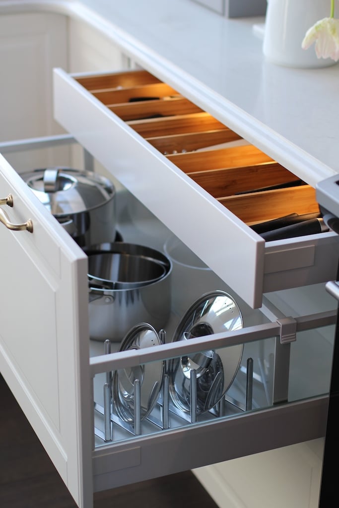 Pot and pan lids are notoriously tricky to organize, which is why this Ikea Sektion lid organizer is a must.