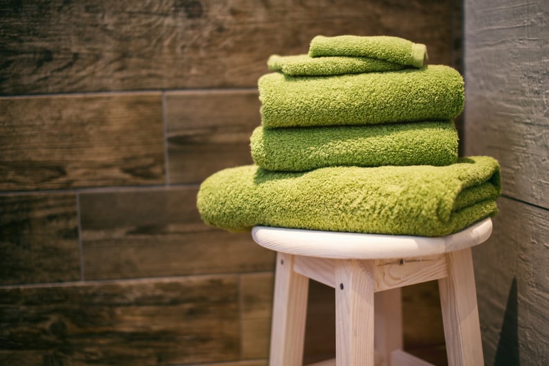 Put towels underneath heavy furniture to avoid ruining floors.