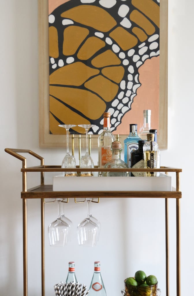 Victoria painted this butterfly in a retro color palette. "I wanted to create a piece that would tie in with the dining area (where it becomes a bit more midcentury and less art deco) and also make sure it was a statement piece," she explains.