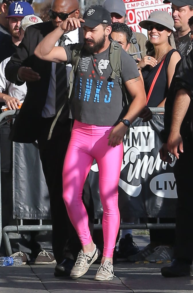 Shia LaBeouf sported hot pink leggings in support of breast cancer awareness while filming for Jimmy Kimmel Live in LA on Monday.