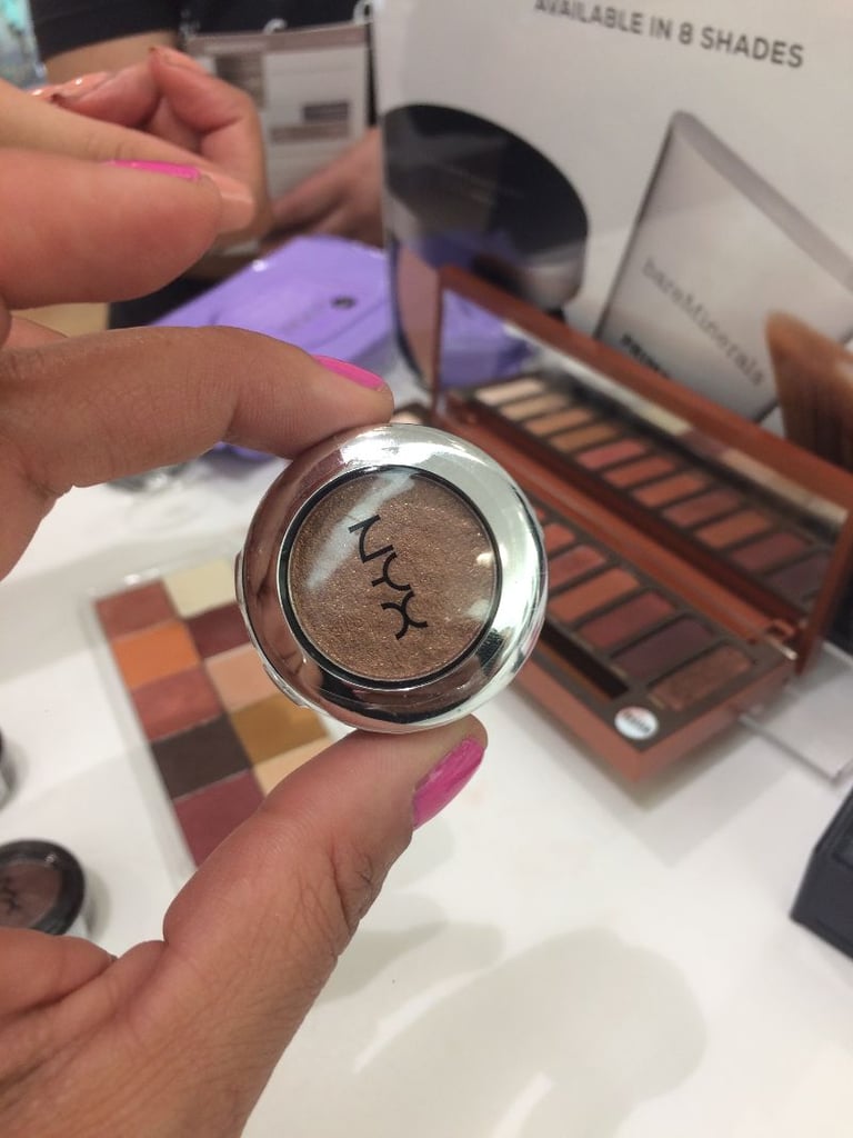 The only color really missing from the NYX palette is the last shade in the Naked Heat palette: a darker shade called "Ember," which you could probably find in your pile of eye shadow palettes.  
If you feel that you really cannot live without that particular shade to create your Naked Heat look, you can buy a single shade from NYX for $5 in shade "Bedroom Eyes" to complete the look.