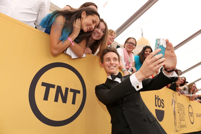 Eddie Redmayne was unbearably cute as he snapped selfies with fans.