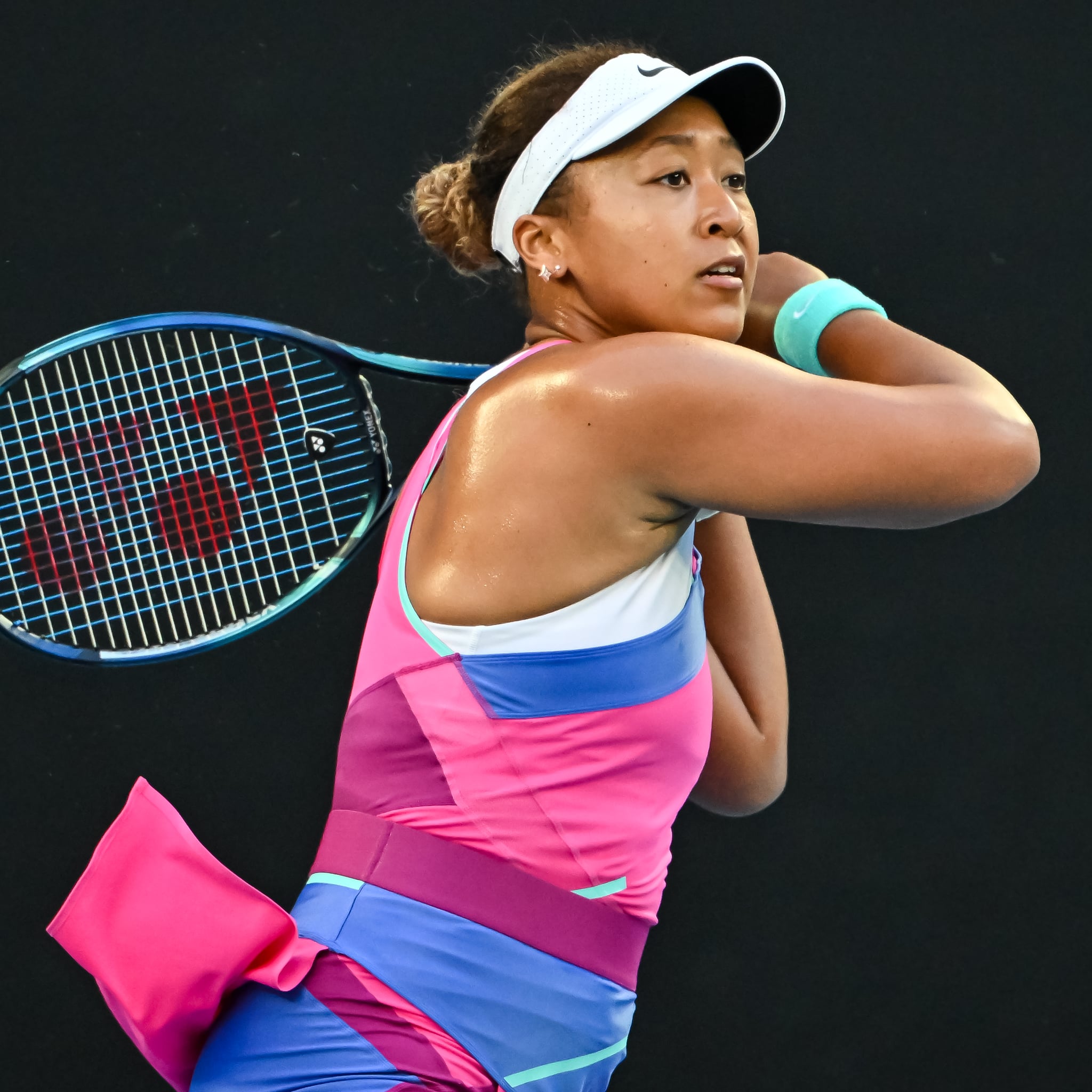 Naomi Osaka gently blessed by a butterfly during her match vs