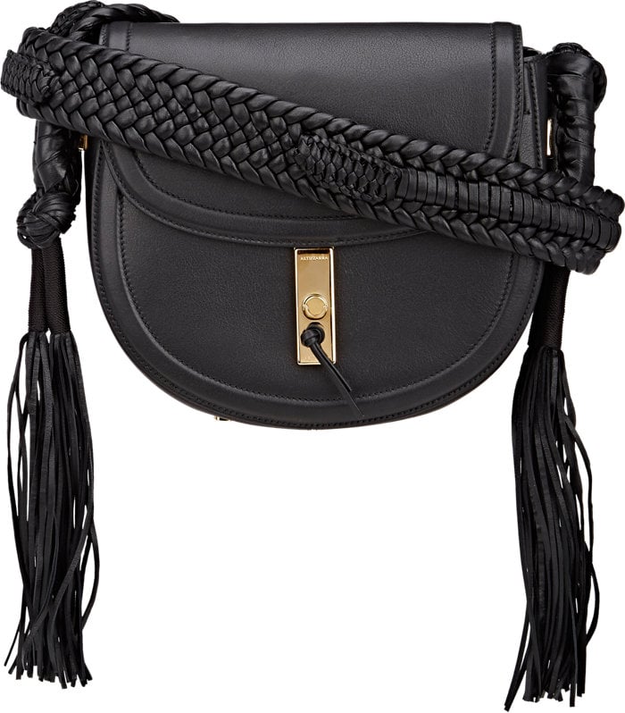 After seeing the new Altuzarra Ghianda Saddle Bag ($2,995) in person, I immediately catalogued it in the back of my brain as a dream bag. From the western-meets-seventies braided strap, to it's ideal size, I can't help but covet it. 
— AM, assistant editor