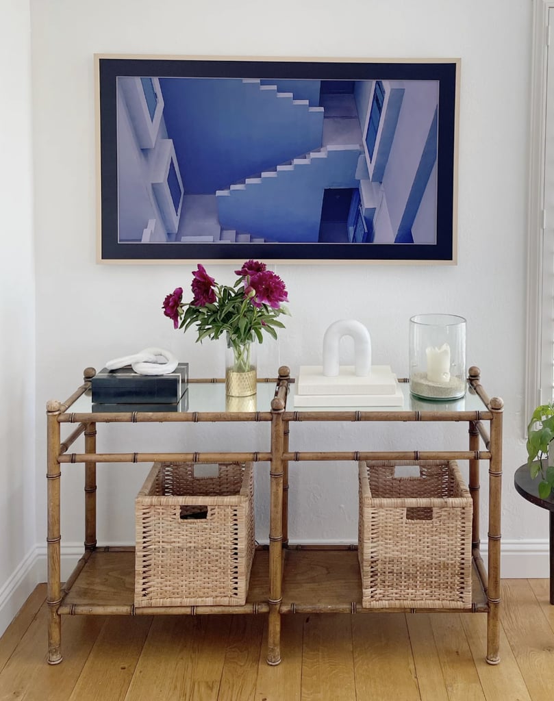 Samsung 65-Inch Class QLED 4K The Frame TV ($979)
"Someone asked me what my favorite purchase of the year was. The answer was easy: the Frame TV. And I'm not alone; it's a bestseller for a reason. When you're watching your favorite shows, the TV features hi-def, 4K Ultra HD picture quality for a clear, crisp picture everyone raves about. What's more, the TV transforms into a gallery when you shift into art mode, displaying stunning paintings of your choosing. Every visitor to my condo raves about it." — Jessica Andrews, senior style editor 
Check out our editor's review of the Samsung Frame TV for more details.
Editor Quote: "If you have the budget and prioritize aesthetics, I think Samsung The Frame TV is worth the money. The difference between what a typical TV looks like on the wall vs. The Frame TV is night and day. Yes, you can find a TV with 4K resolution in the same size for almost half the price, but it won't blend in seamlessly with your decor like The Frame TV does." — Angela Elias, former contributing shopping editor