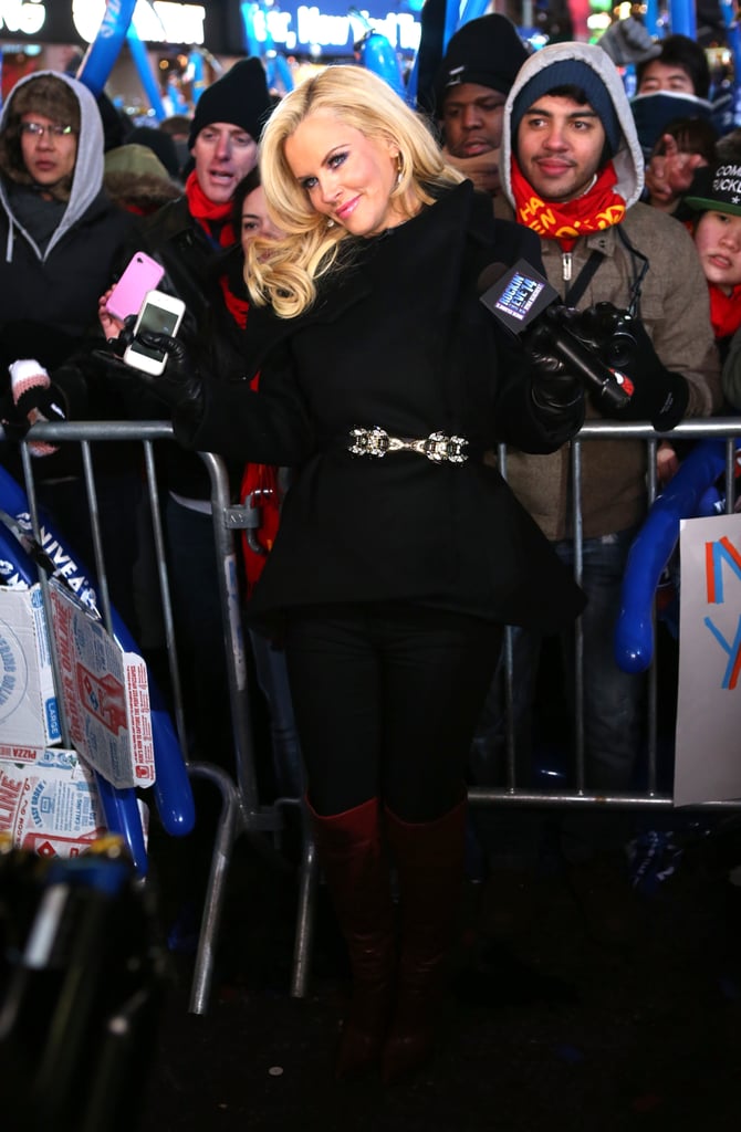 Jenny McCarthy donned a black coat and dark red boots to ring in the New Year in Times Square.