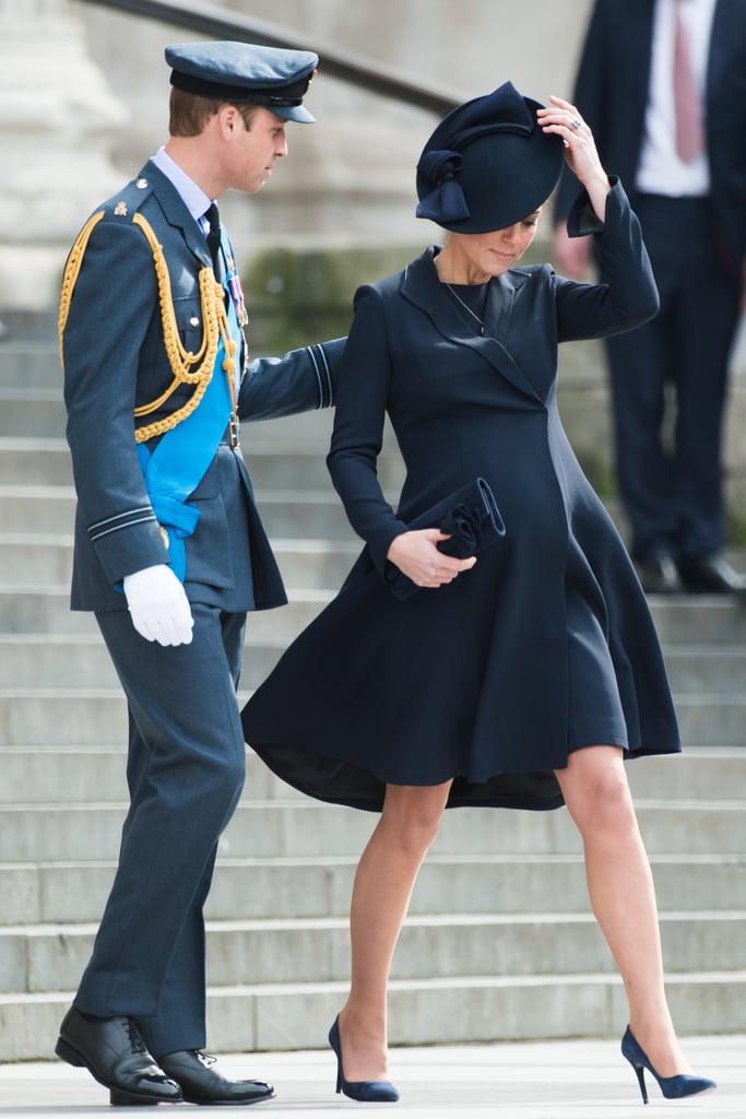 Prince William helped a pregnant Kate along as they attended a March service for troops in London.