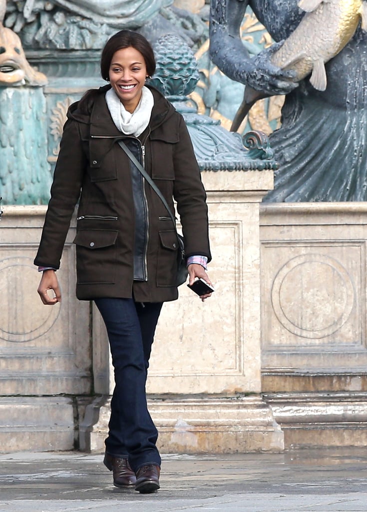 Zoe Saldana flashed a big smile on the set of Rosemary's Baby in Paris on Friday.