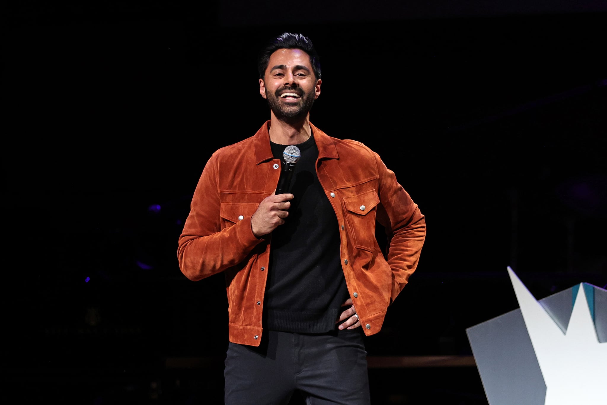  Hasan Minhaj performs during the 16th Annual Stand Up For Heroes Benefit presented by Bob Woodruff Foundation and NY Comedy Festival at David Geffen Hall on November 07, 2022 in New York City. (Photo by Jamie McCarthy/Getty Images for Bob Woodruff Foundation)