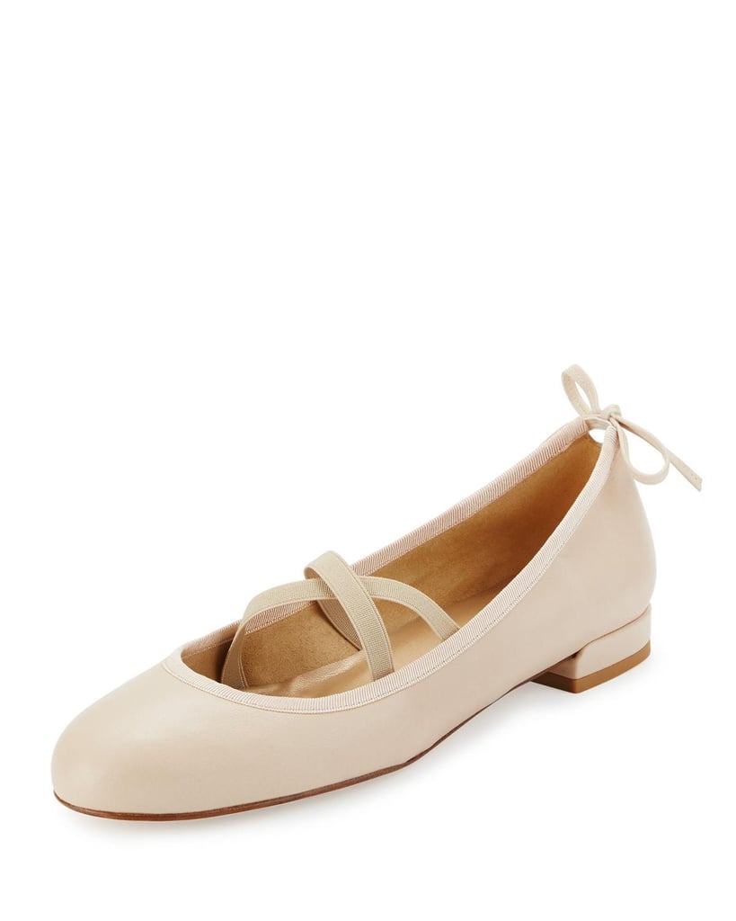 These aren't your average ballet flats. Just check out the crisscross strap detail and bow on the heel of this Stuart Weitzman pair ($375). The small updates make the style new again for Spring.