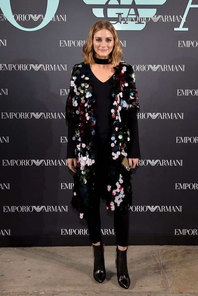 With a paliette-covered tunic, Olivia transformed a basic outfit denim outfit into something event-worthy at the Emporio Armani show.