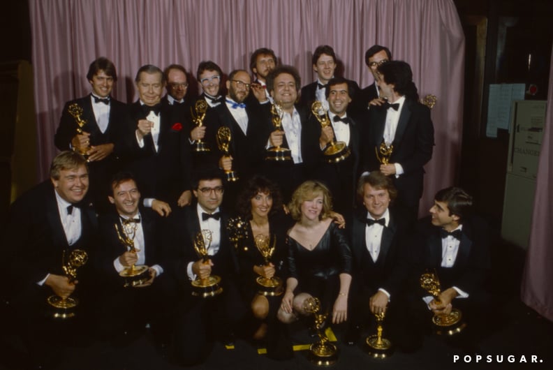 Pasadena, CA - 1982: (L-R) Milton Berle, John Candy, Joe Flaherty, Eugene Levy, Andrea Martin, Catherine O'Hara, Dave Thomas, SCTV crew and cast appearing at the 34th Primetime Emmy Awards, Pasadena Civic Auditorium, Pasadena, CA, September 19, 1982. (Pho