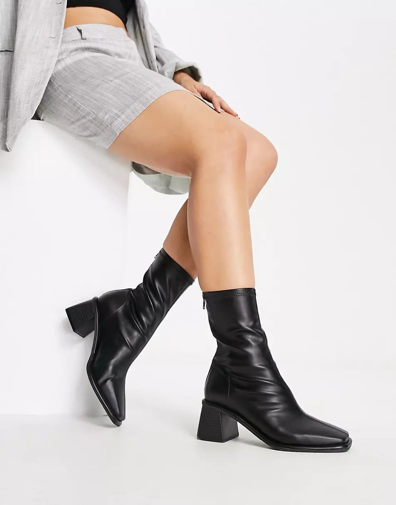 Heeled Black Boots: ASOS DESIGN Wide Fit Rescue Mid-Heeled Sock Boots