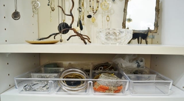 Next I used two bathroom organizers to neatly stash my smaller items. The clear organizer keeps the smaller pieces organized and easy to see.