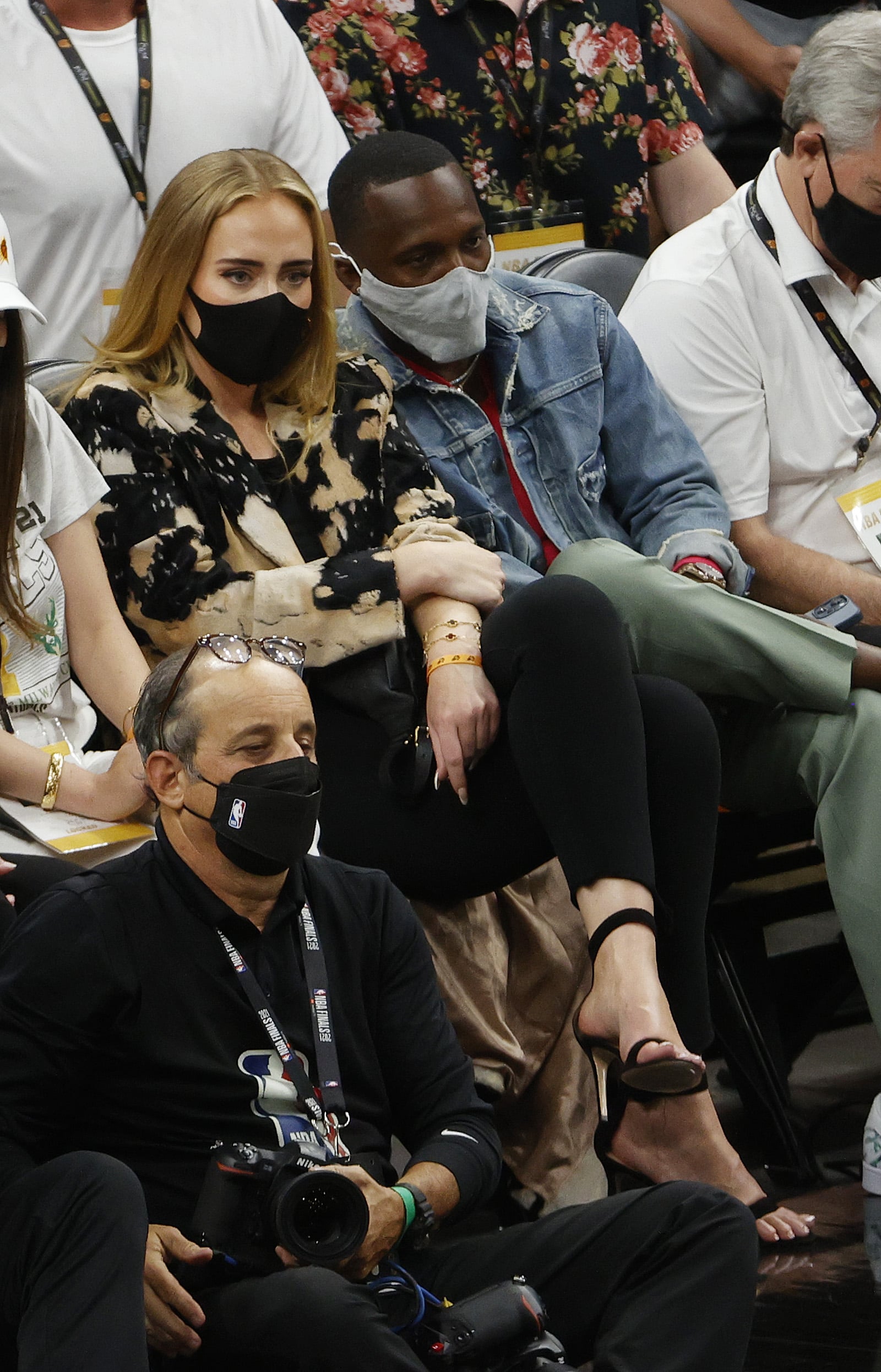 PHOENIX, ARIZONA - JULY 17: Singer Adele looks on next to Rich Paul during the first half in Game Five of the NBA Finals between the Milwaukee Bucks and the Phoenix Suns at Footprint Center on July 17, 2021 in Phoenix, Arizona. NOTE TO USER: User expressly acknowledges and agrees that, by downloading and or using this photograph, User is consenting to the terms and conditions of the Getty Images License Agreement.  (Photo by Christian Petersen/Getty Images)
