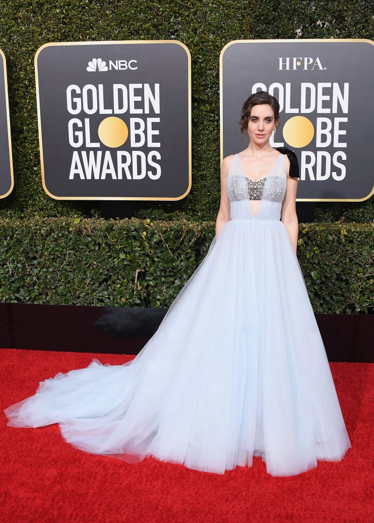 Alison Brie wearing a custom pale blue tulle with a hand embroidered crystal and pearl bustier. She accessorized with Harry Winston jewels.