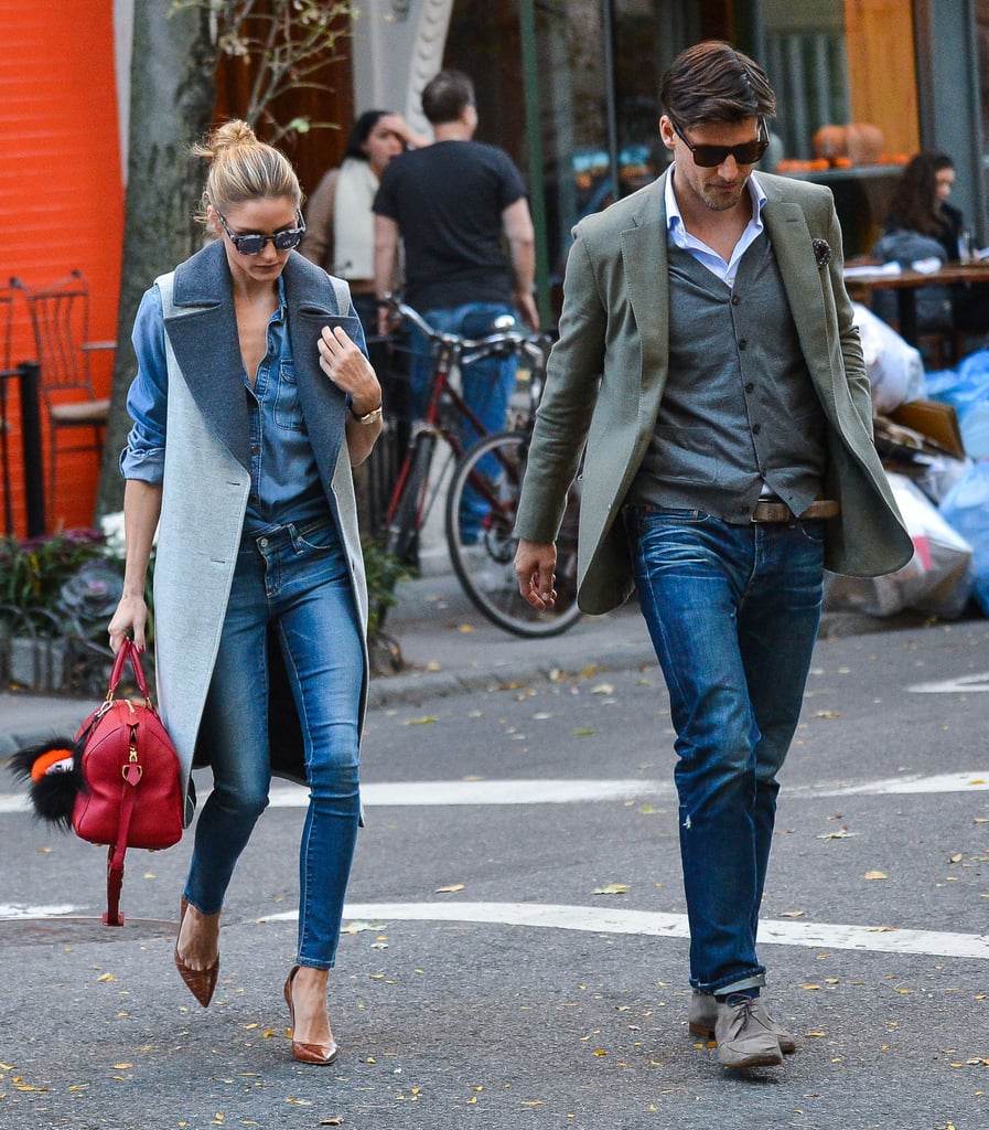 While Olivia layered a gray and blue collared vest over her look, Johannes slipped a gray cardigan and tailored blazer over his button-down.