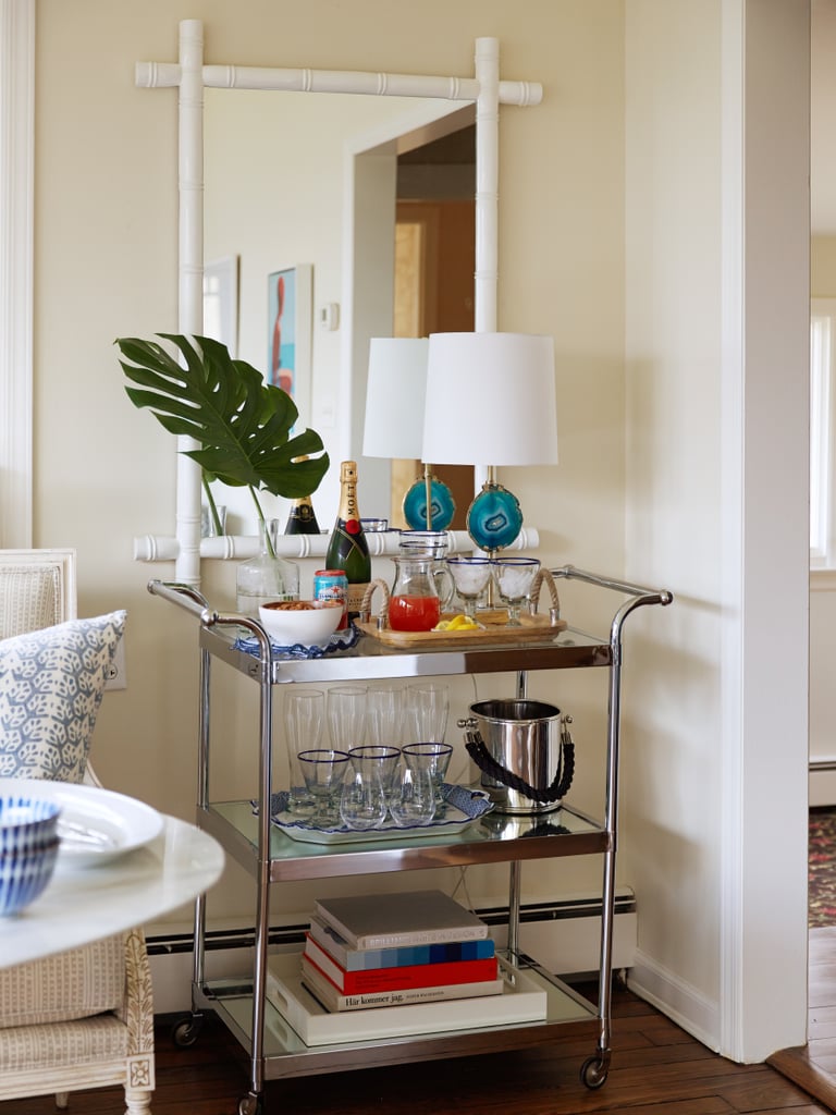A bar cart isn’t just convenient; when used as a showcase for pretty objects and barware, it’s also a great way to add eye-catching shine to a room.