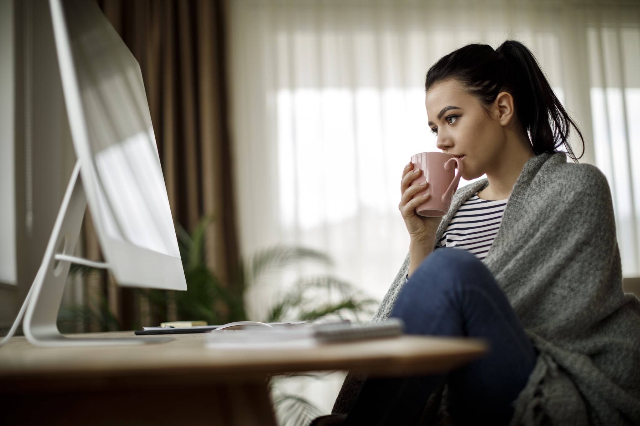 Young woman working at home