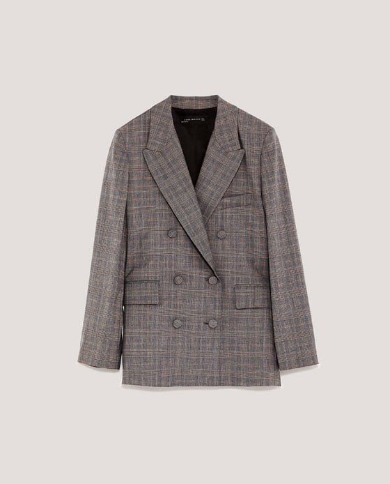 For something with a real hit of menswear style, try the Zara Double-Breasted Jacket With Lined Buttons ($100).