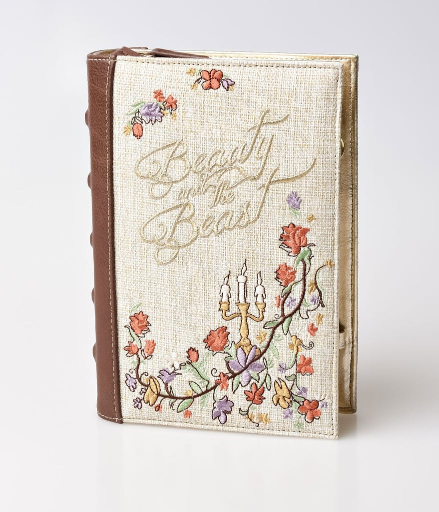 Danielle Nicole Brown & Woven Beauty & The Beast Book Clutch ($58)