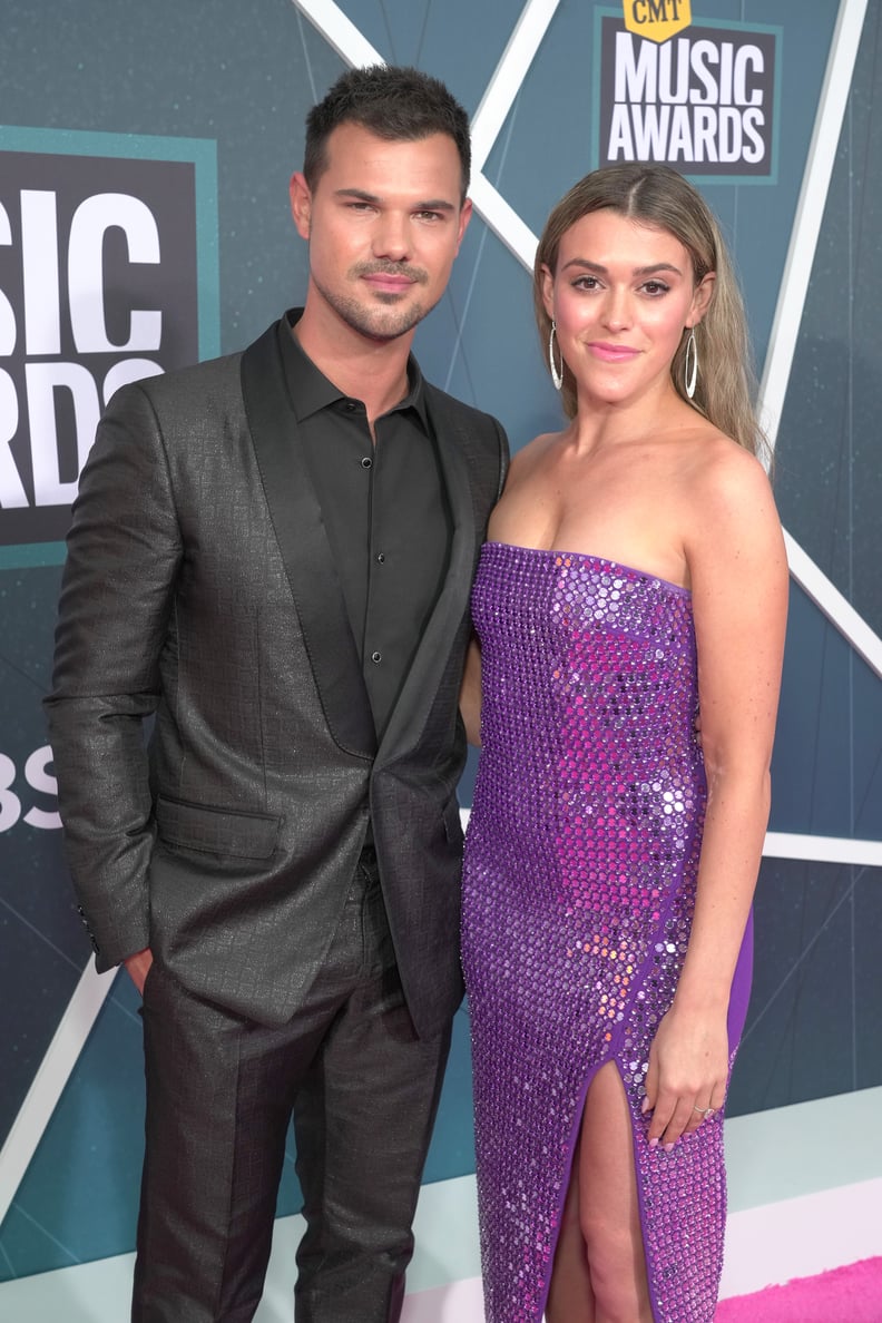 NASHVILLE, TENNESSEE - APRIL 11: Taylor Lautner and Taylor Dome attend the 2022 CMT Music Awards at Nashville Municipal Auditorium on April 11, 2022 in Nashville, Tennessee. (Photo by Kevin Mazur/Getty Images for CMT)