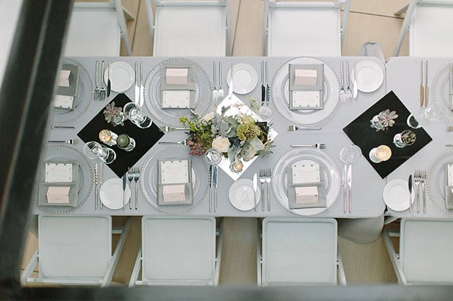 Small succulent vignettes make a big impact at a lower price; plus, they serve double-duty as a guest favor at the end of the night.
Photo by Cacá Santoro Photography via Green Wedding Shoes