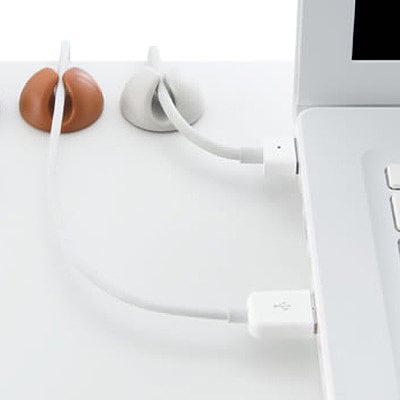 Keep your desktop clean with easy cable organizers. Keep your desktop clean with easy cable organizers.