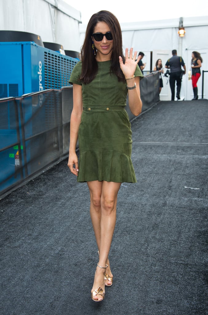 While on the street at New York Fashion Week, Meghan opted for a green minidress.