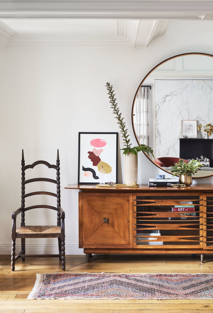 We love how the actress puts a modern spin on a space using supereclectic pieces, like this Gothic chair and a credenza that screams 1950s chic.