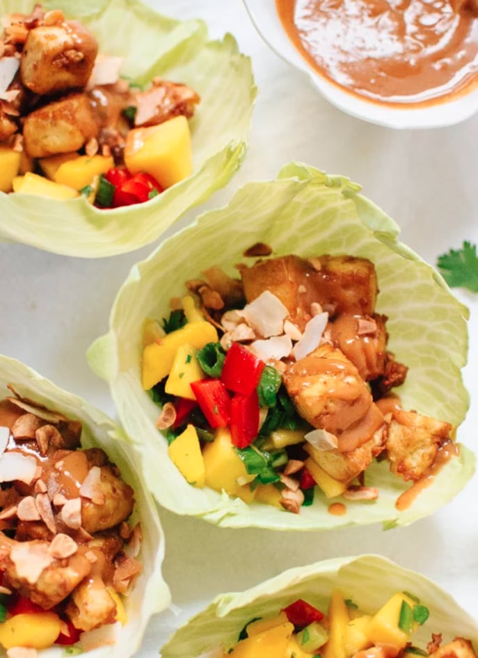 Thai Mango Cabbage Wraps With Crispy Tofu and Peanut Sauce