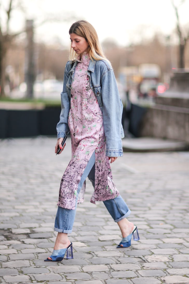 Instead of wearing a top with your denim on denim look, layer in a dress. It’s a good way to break up the similar blue tones in your outfit.