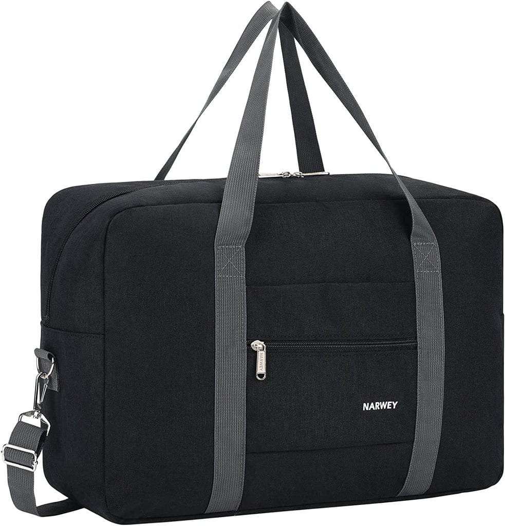 Narwey Foldable Travel Duffel Bag ($14) 
The Narwey Foldable Travel Duffel Bag is a foldable and affordable travel option that comes in a ton of different colors and prints. It has two top-handle carrying straps, a detachable shoulder strap, a trolley sleeve, and an external zipper pocket. The bag is made from a thick waterproof material that can hold its shape. Plus, it's a bestseller on Amazon.
Pros: Lightweight and budget-friendly.
Cons: Strap and zipper quality isn't the most durable.
Material: Polyester.
Dimensions: 13" height x 18" width x 6.3" depth
Colorways: 34
Who it's best for: The frequent traveler.
Extras: It's great if you're flying Spirit or Frontier Airlines.
What Reviewers Say: "I was very hesitant at first when I received my package, as you can see it was almost the size of my hand. After unwrapping it I was really surprised by how spacious it was! I put about four days worth of clothes with two pairs of shoes and there was still some space left!"