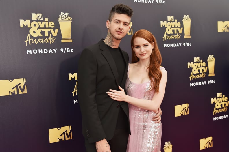 SANTA MONICA, CA - JUNE 16:  Actors Travis Mills (L) and Madelaine Petsch attend the 2018 MTV Movie And TV Awards at Barker Hangar on June 16, 2018 in Santa Monica, California.  (Photo by Jeff Kravitz/FilmMagic)