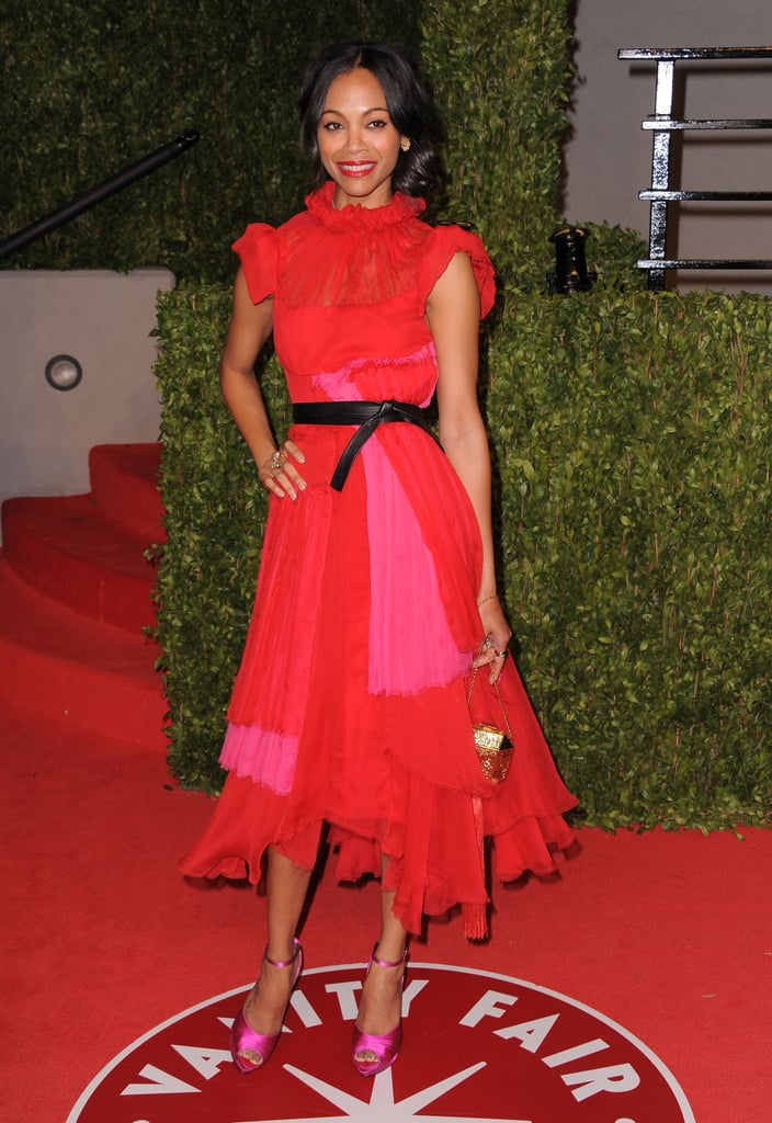At the 2011 Vanity Fair Oscar Party, Zoe wore this gorgeous red ruffled dress by Prabal Gurung. At the 2011 Vanity Fair Oscar Party, Zoe wore this gorgeous red ruffled dress by Prabal Gurung.