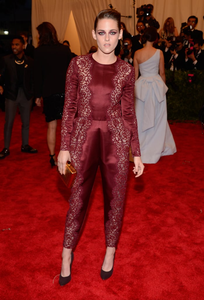 As modern-day punk royalty, we counted on Stewart to bring her edgy A-game to this year's Met Gala — and the actress didn't disappoint. The brunette beauty stunned in an oxblood lace-inset jumpsuit — complete with coordinating eye shadow and nail polish — studded pumps, and a mirrored box clutch, all by Stella McCartney.