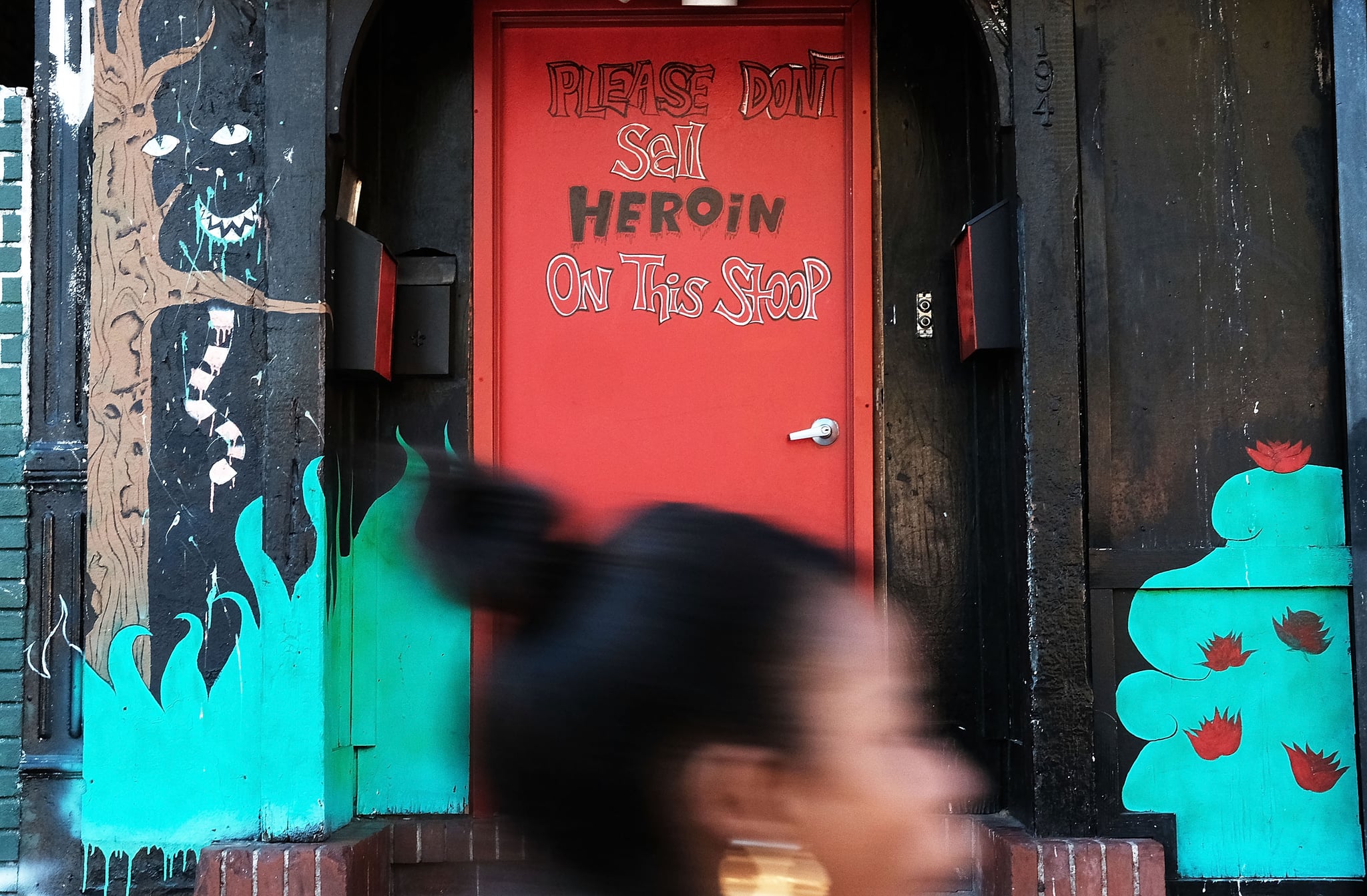 NEW YORK, NY - OCTOBER 14:  A door is painted with the message to stop selling heroin on a street in a neighborhood with a high rate of poverty and illegal drug use on October 14, 2016 in New York City. Staten Island, a New York City borough, is in the grip of a heroin crisis which has claimed hundreds of lives and turned some neighborhoods into drug markets. This year alone there have been 71 overdose deaths on Staten Island. The city has opened numerous clinics and programs to try and control the epidemic in the mostly middle class borough.  (Photo by Spencer Platt/Getty Images)