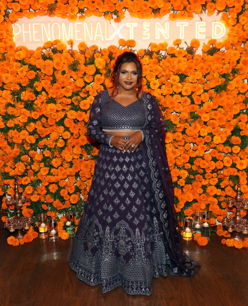 Kaling hosted a star-studded Diwali dinner in November 2021 at Bombay Palace in LA, where she showed off a custom outfit from Falguni Shane Peacock. The navy ensemble featured silver embroidery and was complete with pearl drop earrings and jewel-tone gemstone rings.