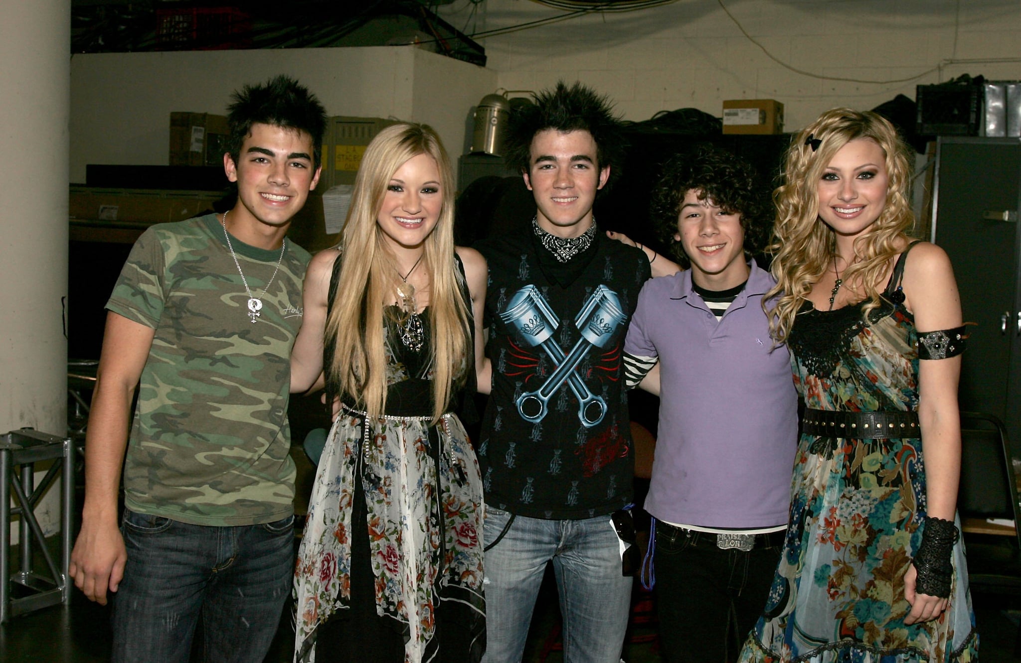 ANAHEIM, CA - JULY 22:  (L-R) Joseph Jonas, AJ Michalka, Kevin Jonas, Nicholas Jonas and Aly Michalka pose backstage at the Radio Disney Totally 10 Birthday Concert held at the Arrowhead Pond of Anaheim on July 22, 2006 in Anaheim, California.  (Photo by Frazer Harrison/Getty Images for Radio Disney)