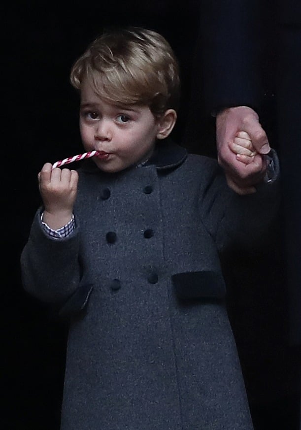 Prince George nibbled on a candy cane while leaving church in 2016.