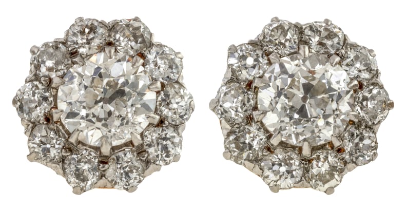 What are the most important factors when buying a pair of diamond studs, and how can you do it on a budget?