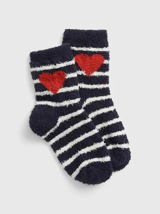 Stripes and bright red hearts make these Kids Cozy Socks ($7) totally adorable.