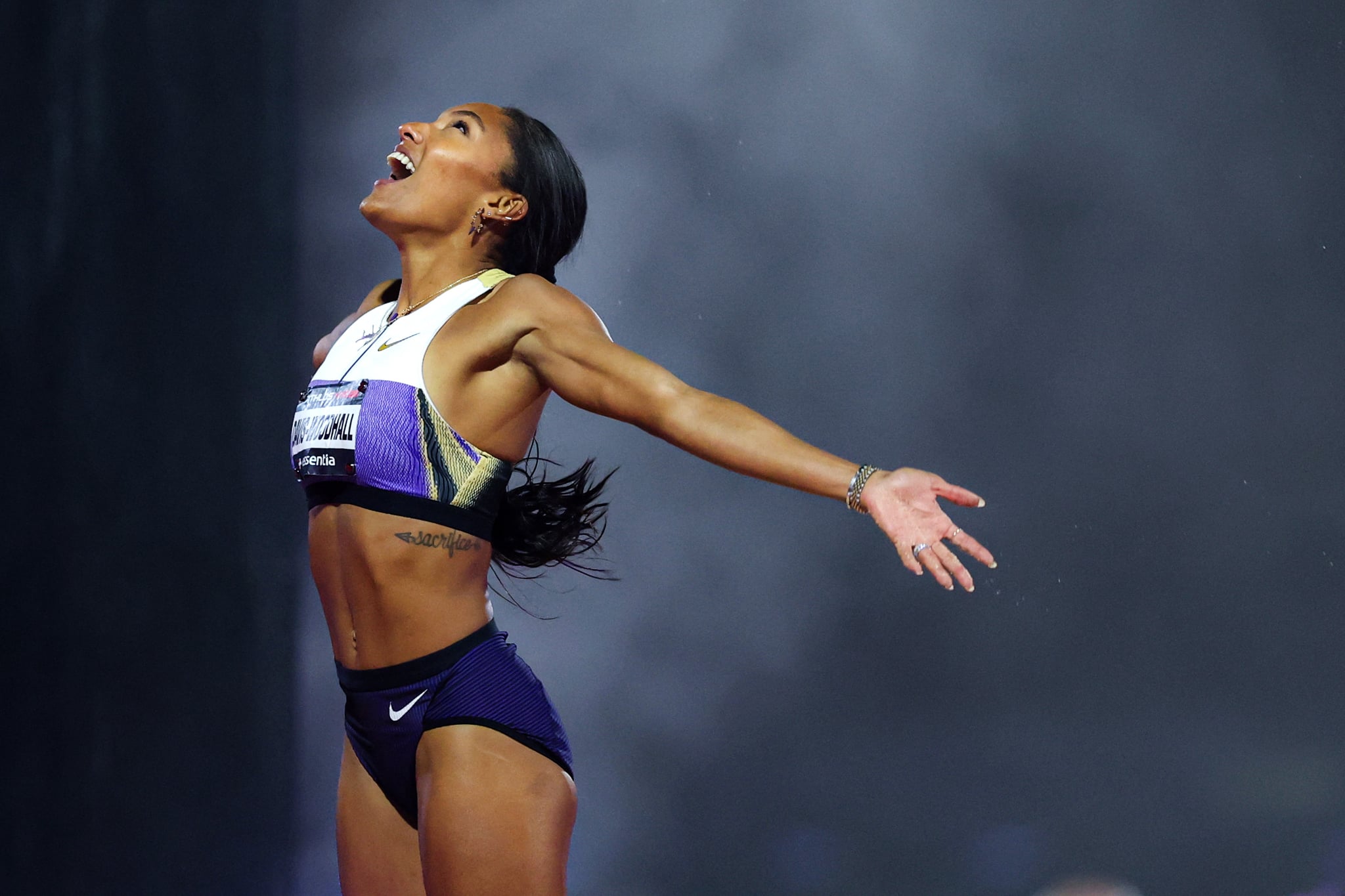 NEW YORK, NEW YORK - OCTOBER 10: Tara Davis-Woodhall of the United States reacts after competing in the final round of the long jump during ATHLOS NYC25 on October 10, 2025 at Icahn Stadium on Randall's Island in New York City. (Photo by Ishika Samant/Getty Images for Athlos)