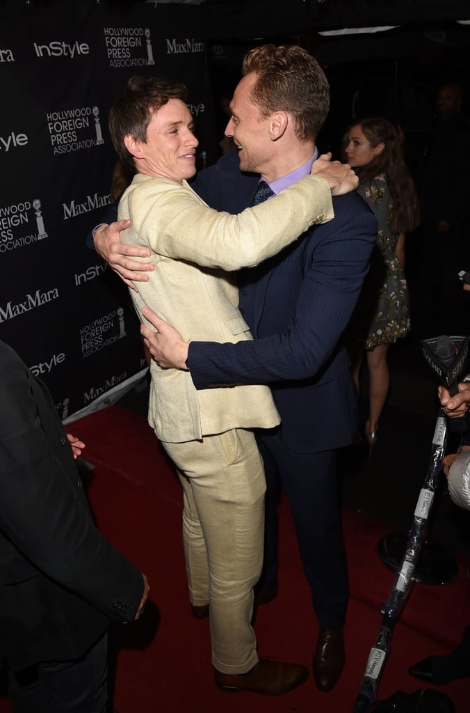 Eddie and Tom shared a sweet hug on the red carpet at the Toronto Film Festival in September 2015.