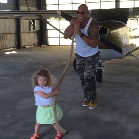 Dwayne "The Rock" Johnson Helps Little Girl Pull Airplane